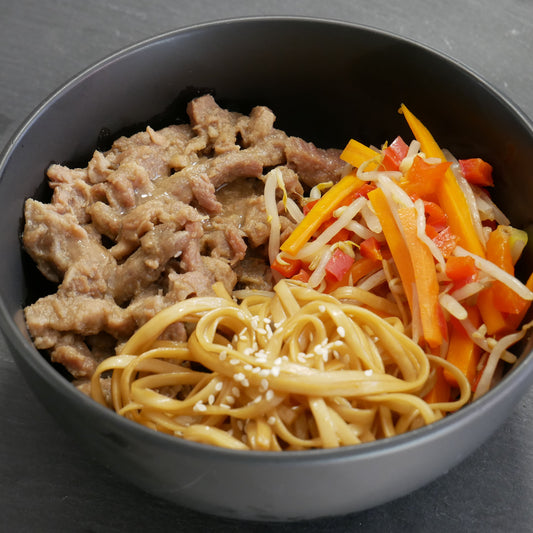 Porc caramel et son wok de légumes